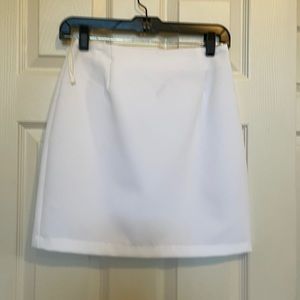 Short white skirt never been worn.